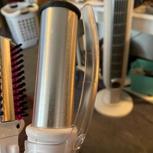 In styler 1.25" Rotating Iron, PRIME straightens better than a flat iron.